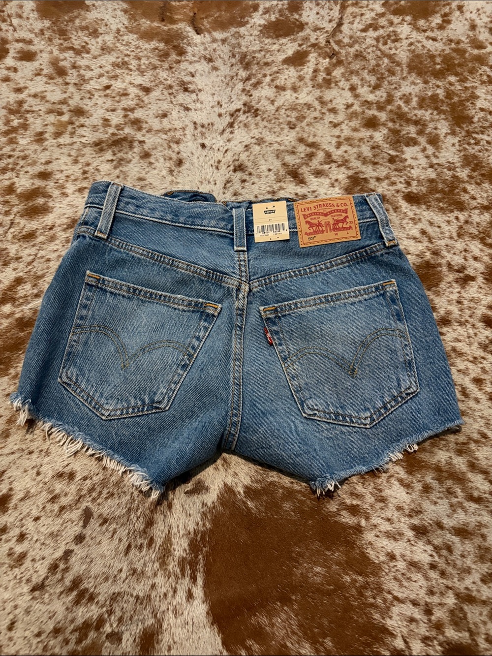 Levi's Medium Blue Denim Cutoff Shorts with Frayed Hem